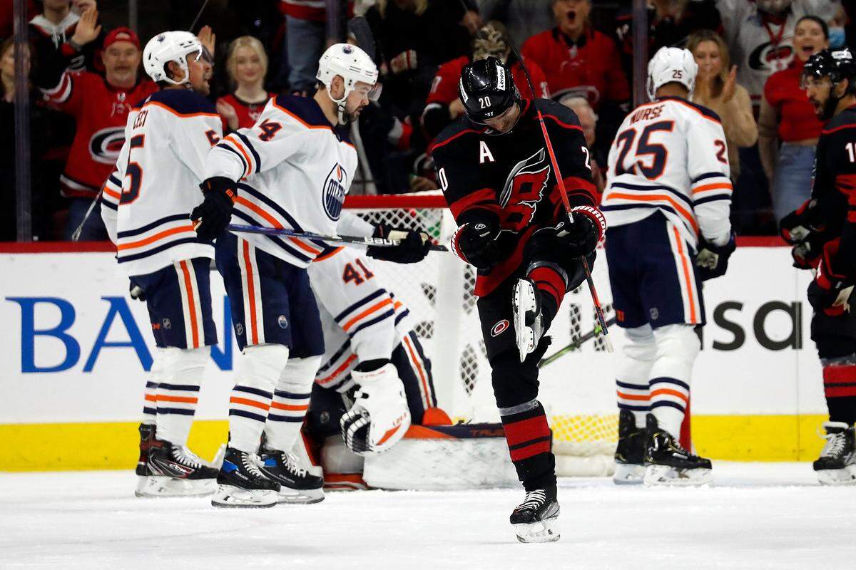 Carolina Hurricanes’ Sebastian Aho (20) celebrates his goal against the Edmonton Oilers during the first period of an NHL hockey game in Raleigh, N.C., Sunday, Feb. 27, 2022. (AP Photo/Karl B DeBlaker)