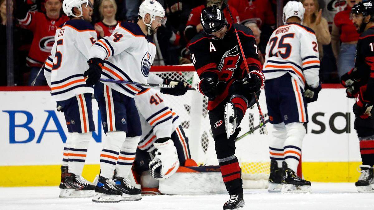 Carolina Hurricanes’ Sebastian Aho (20) celebrates his goal against the Edmonton Oilers during the first period of an NHL hockey game in Raleigh, N.C., Sunday, Feb. 27, 2022. (AP Photo/Karl B DeBlaker)