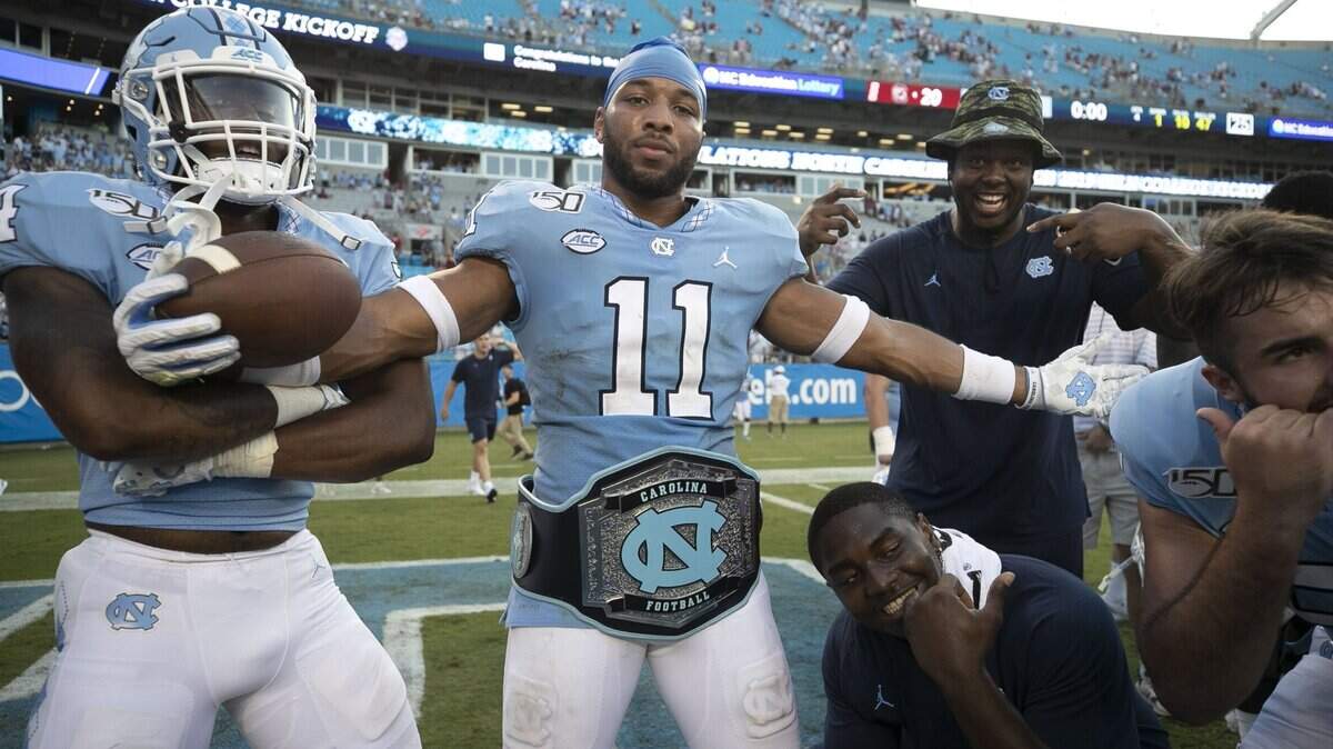North Carolina’s Myles Wolfolk (11) celebrates the Tar Heels’ 24-20 victory over South Carolina on Saturday, August 31, 2019 at Bank of America Stadium in Charlotte, N.C. Wolfolk had two interceptions in the last thee minutes of the fourth quarter to help seal the Tar Heels’ victory.