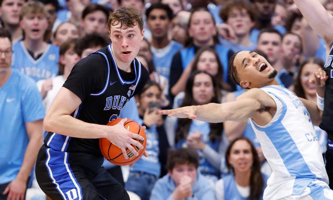 Duke’s Cooper Flagg (2) steals the ball from North Carolina’s Seth Trimble (7) during the second half of Duke’s 82-69 victory over UNC at the Smith Center in Chapel Hill, N.C., Saturday, March 8, 2025.