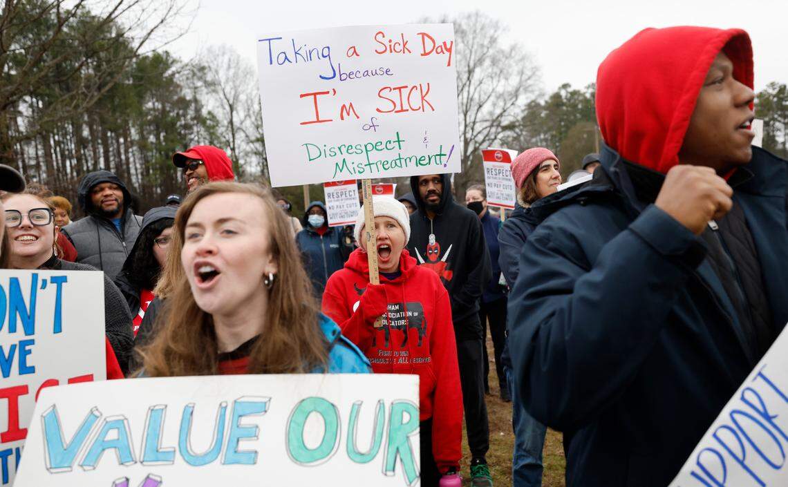 Melissa Feimster Lido, center, a teacher at Riverside High School, was one of the many who gathered for a rally at Durham Public Schools Staff Development Center in Durham, N.C., Wednesday, Jan. 31, 2024. Some Durham public schools were closed Wednesday as staff — furious about unresolved salary issues — called in sick to attend protests.