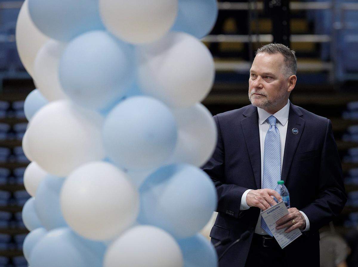 New North Carolina men’s basketball head coach Michael Malone looks out on the crowd following an introductory press conference at the Smith Center on Tuesday, April 7, 2026, in Chapel Hill, N.C. 