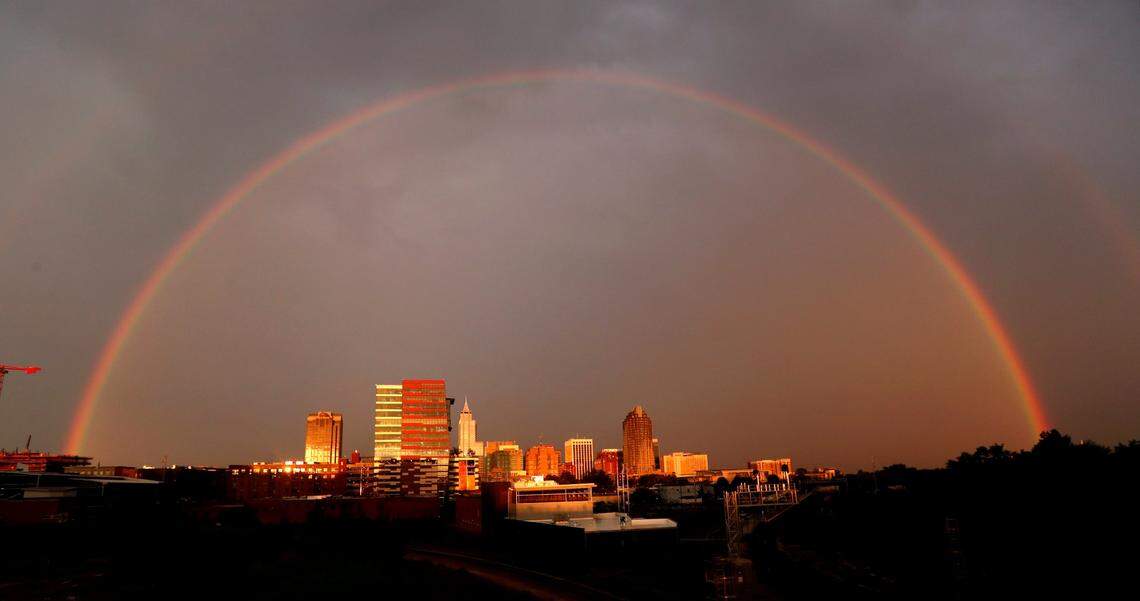 A rainbow appears over downtown Raleigh, N.C., as seen from the Boylan Avenue bridge, Monday evening, August 17, 2020.
