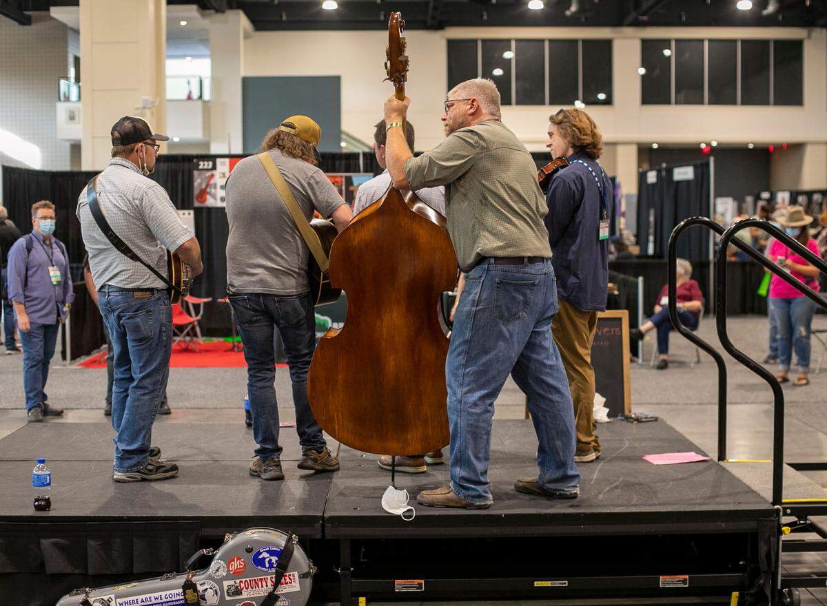 Bass player Todd Kirchner and members of Full Cord Bluegrass from Grand Haven, Michigan perform on Thursday, September 29, 2021 at the Raleigh Convention Center in Raleigh, N
