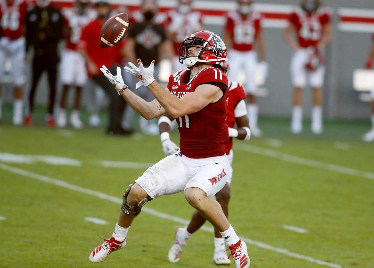N.C. State linebacker Payton Wilson (11) makes an interception during the Wolfpack’s 31-20 victory over Duke in October 2020.