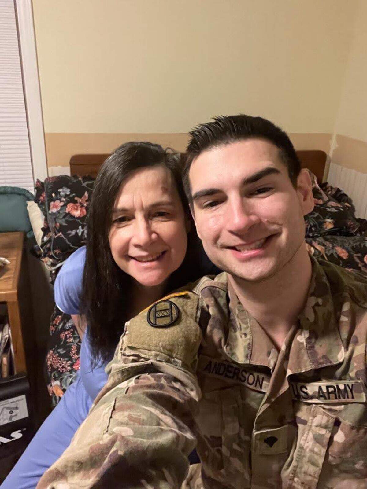 Stuart Heath Anderson poses with his mother, Marion Anderson, while serving in the NC National Guard before volunteering to fight in Ukraine.