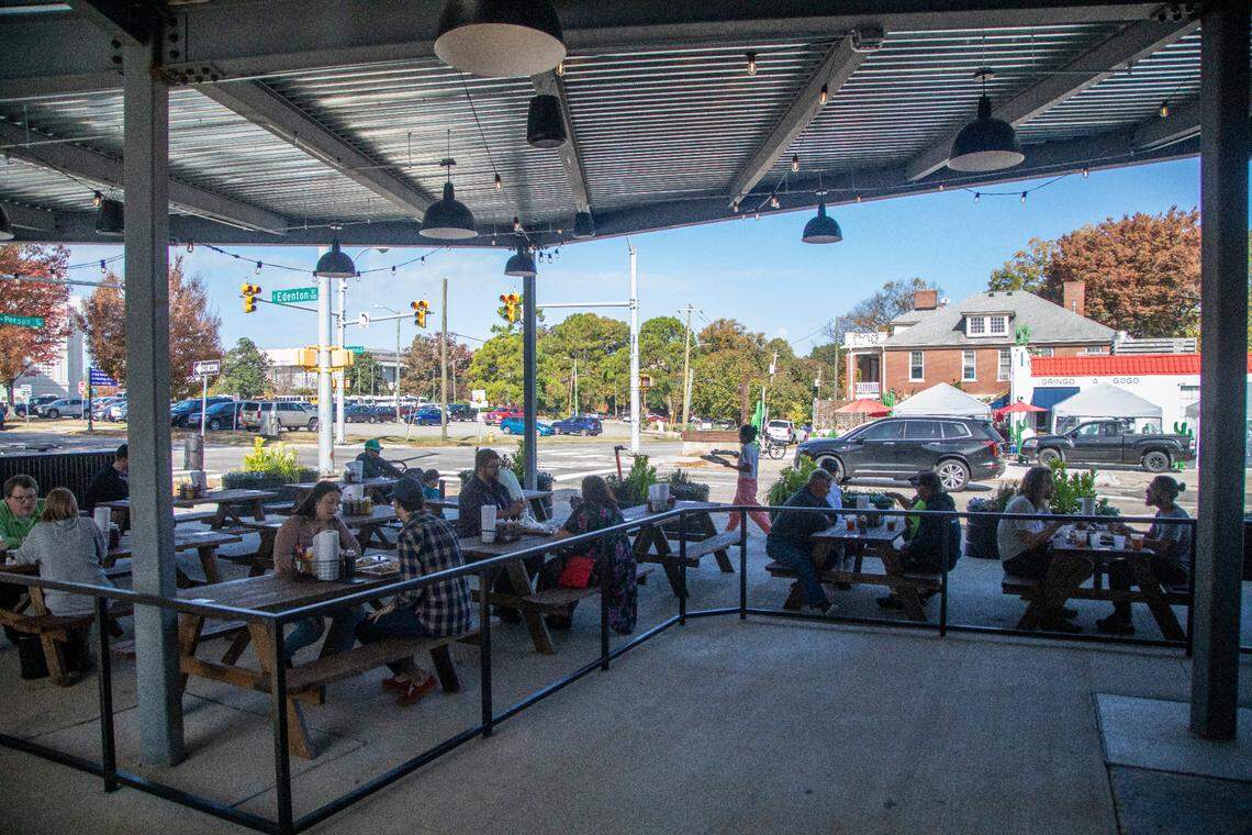 Customers dine during the opening of Longleaf Swine in Raleigh Friday, Nov. 4, 2022.