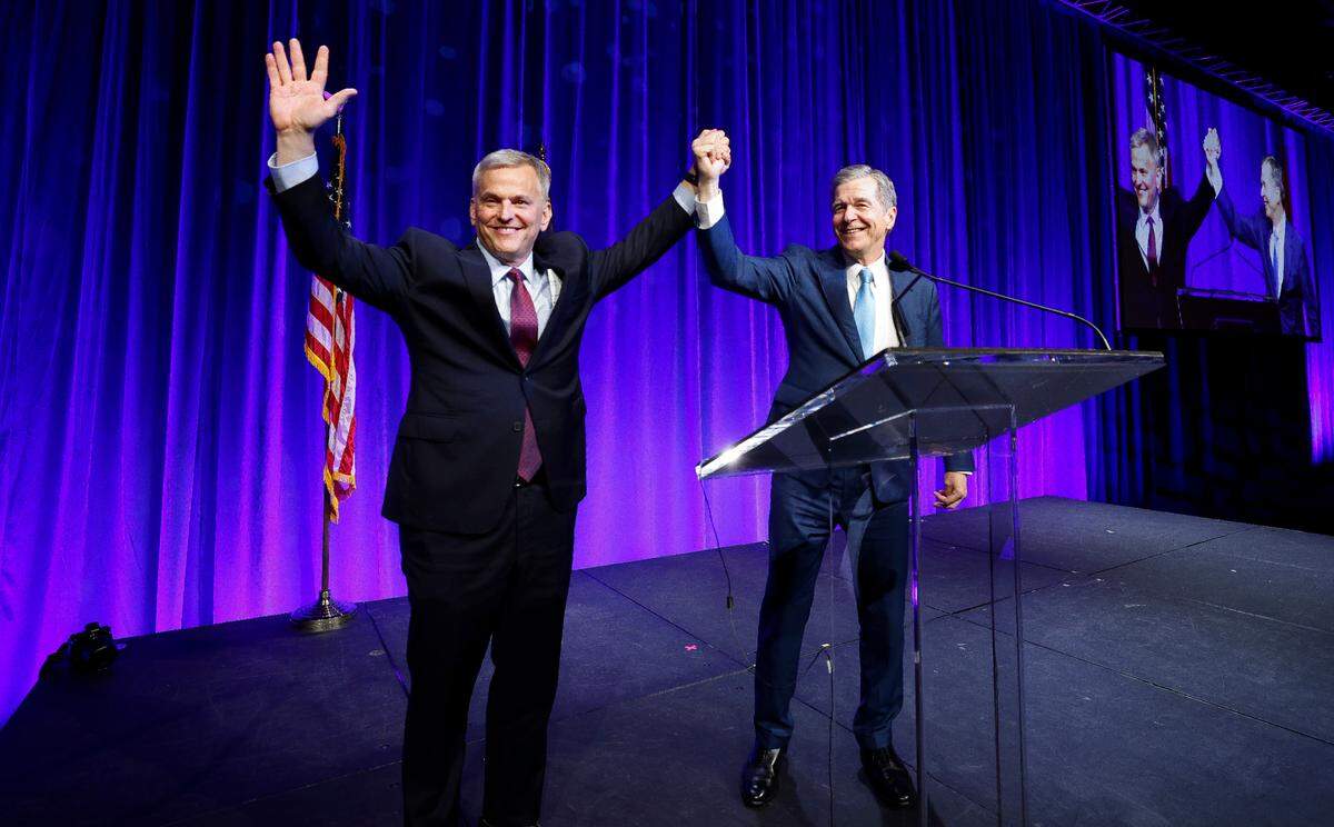 Gov. Roy Cooper introduces Democratic nominee for governor Josh Stein during the North Carolina Democratic Party Unity Dinner at the Raleigh Convention Center Saturday, July 20, 2024