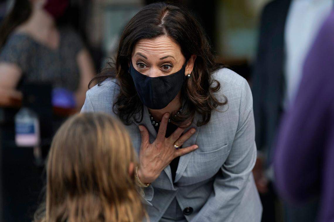 Democratic vice presidential candidate Sen. Kamala Harris, D-Calif., greets Dylan Eitto at Trophy Brewing and Pizza during a campaign visit in Raleigh, N.C., Monday, Sept. 28, 2020.