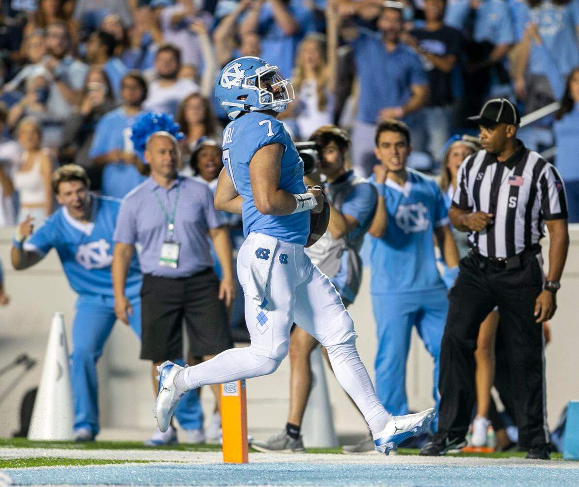 North Carolina quarterback Sam Howell (7) scores on a 22-yard run to give the Tar Heels’ a 7-0 lead in the first quarter against Georgia State on Saturday, September 11, 2021 at Kenan Stadium in. Chapel Hill, N.C.