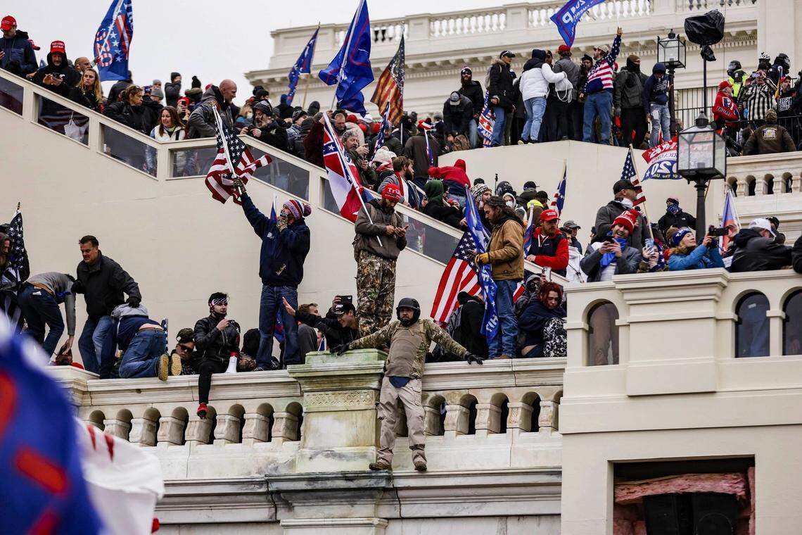 Pro-Trump supporters storm the U.S. Capitol following a rally with President Donald Trump on Wednesday, Jan. 6, 2021, in Washington, D.C. (Samuel Corum/Getty Images/TNS)
