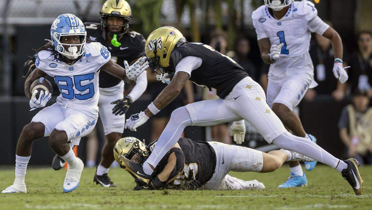 North Carolina wide receiver Shanard Clower (85) picks up 11 yards after a pass reception from quarterback Gio Lopez in the second quarter against Central Florida on Saturday, September 20, 2025 at Acrisure Bounce House Stadium in Orlando, Fla.