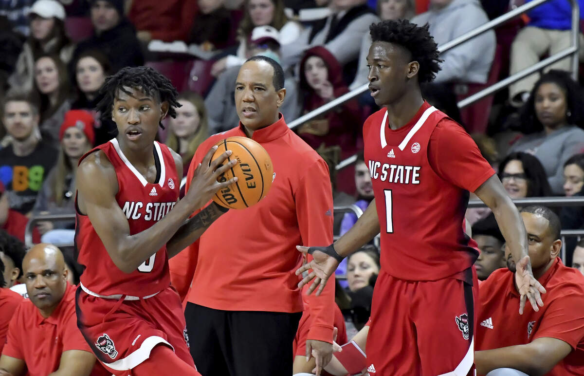 North Carolina State head coach Kevin Keatts watches his players during the second half of an NCAA college basketball game, Saturday, Feb. 11, 2023, in Boston. (AP Photo/Mark Stockwell)