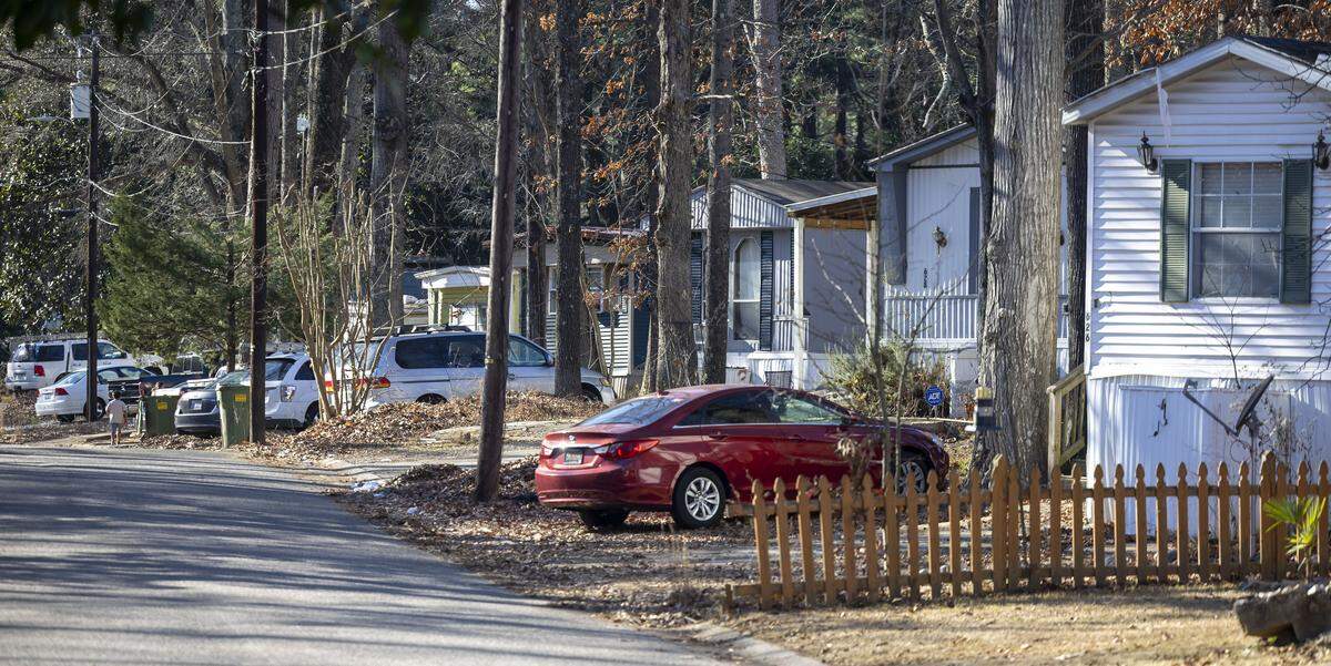 Homes along Maple Avenue in the Chatham Estates Mobile Home Park on Wednesday, December 24, 2025 in Cary, N.C.