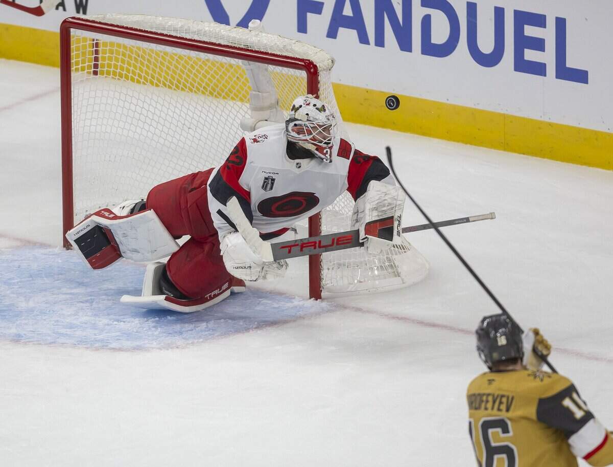 Carolina Hurricanes goalie Brandon Bussi (32) deflects a shot by Vegas right wing Pavel Dorofeyev (16) in the first period during Game 6 of the Stanley Cup Final, on Sunday, June 14, 2026 at T-Mobile Arena in Las Vegas, NV.