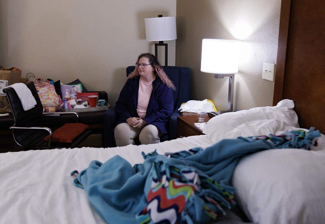 Heather Gibbs, a displaced tenant of Camelot Village, is photographed on Wednesday, Aug. 20, 2025, in a room at a Comfort Inn where she has stayed for six weeks after floodwaters from Tropical Depression Chantal filled her apartment. These accommodations, paid for with emergency funds from Chapel Hill and Orange County, will end next week, leaving at least six people at risk of homelessness. 