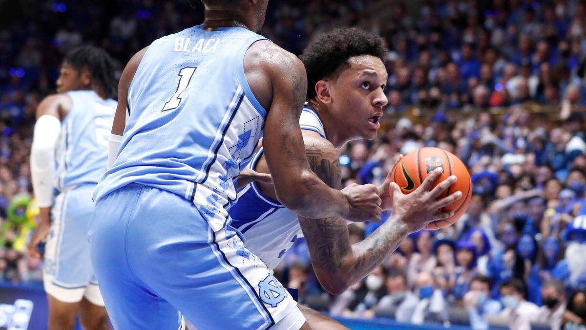 Dukeís Paolo Banchero (5) works against North Carolina’s Leaky Black (1) during the first half of Dukeís game against UNC at Cameron Indoor Stadium in Durham, N.C., Saturday, March 5, 2022.