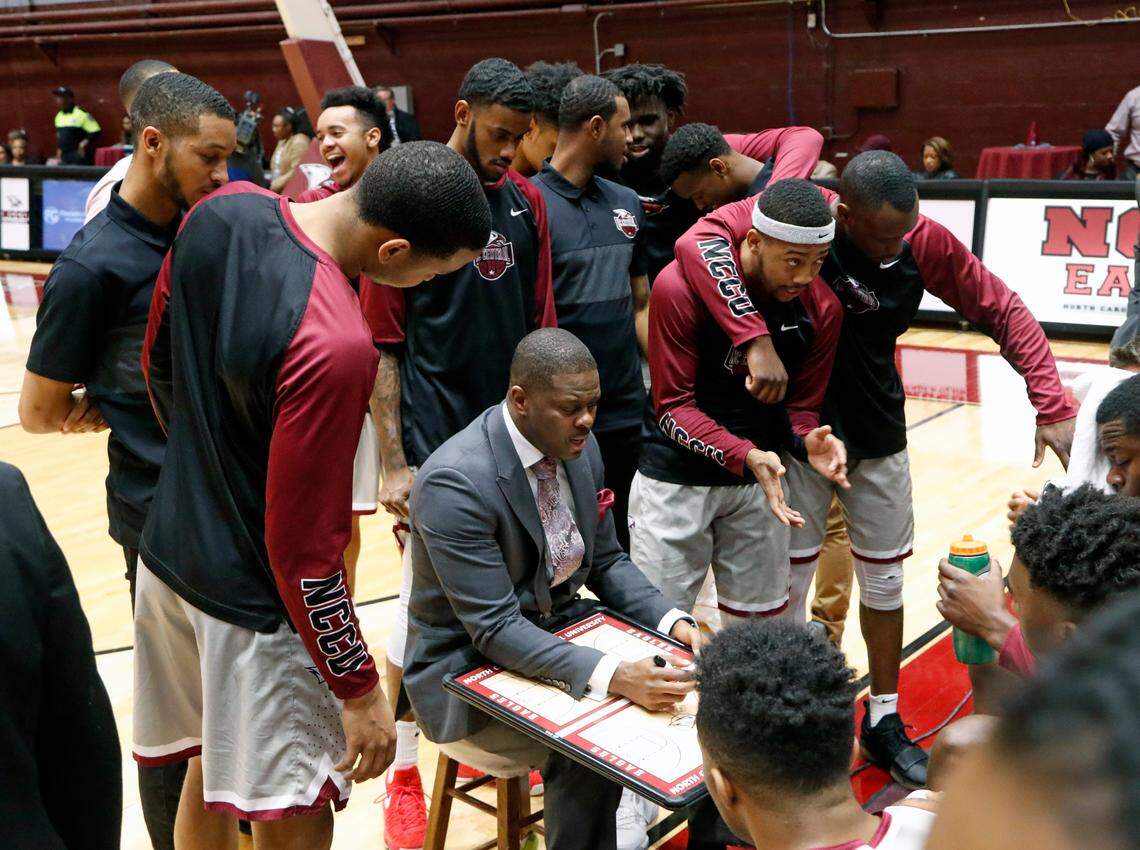 NCCU head coach LeVelle Moton diagrams a play for his players before the start of a game against Hampton. He had his jersey retired during halftime of the Eagles game at McDougald-McClendon Arena on the NCCU campus on Feb. 5, 2018.