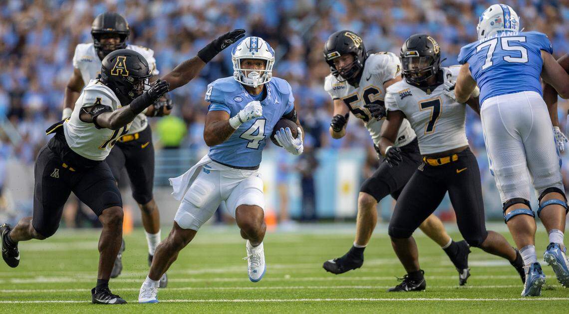 North Carolina running back Caleb Hood (4) breaks open for a 13-yard gain in the second quarter against Appalachian State on Saturday September 9, 2023 at Kenan Stadium in Chapel Hill, N.C.