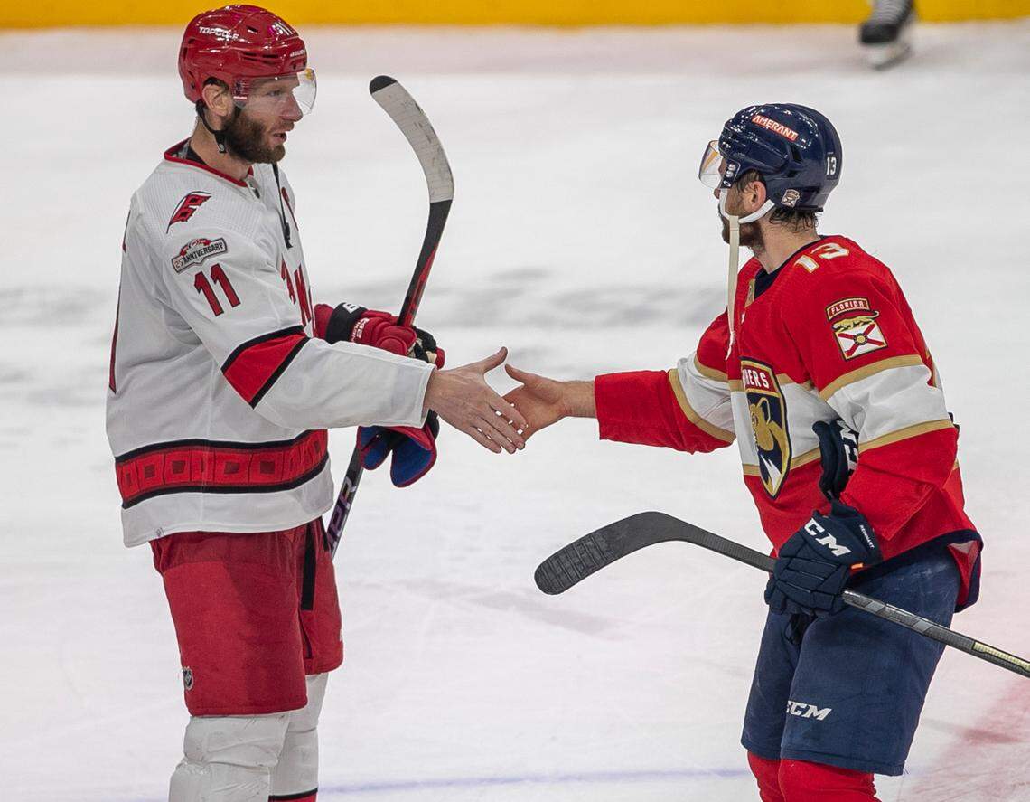 The Carolina Hurricanes Jordan Staal (11) begins the handshake line by congratulating the Florida Panthers Sam Reinhart (13) following the Panthers’ 4-3 victory, clinching the Eastern Conference Finals, on Wednesday, May 24, 2023 at FLA Live Arena in Sunrise, Fla.