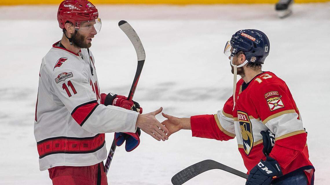 The Carolina Hurricanes Jordan Staal (11) begins the handshake line by congratulating the Florida Panthers Sam Reinhart (13) following the Panthers’ 4-3 victory, clinching the Eastern Conference Finals, on Wednesday, May 24, 2023 at FLA Live Arena in Sunrise, Fla.