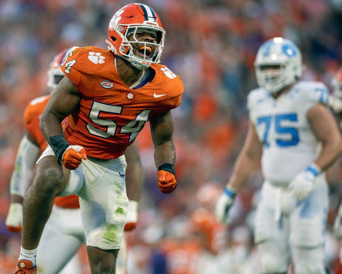 Clemson’s Jeremiah Trotter Jr. reacts after sacking North Carolina quarterback Drake Maye (10) for an five-yard loss in the second quarter on Saturday, November 18, 2023 at Memorial Stadium in Clemson, S.C.
