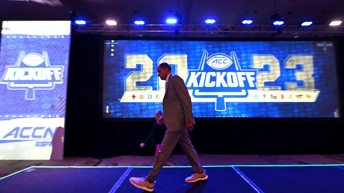 ACC Commissioner James Phillips exits the stage following his presentation during the first day of the 2023 ACC Football Kickoff event in Charlotte, NC on Tuesday, July 25, 2023.