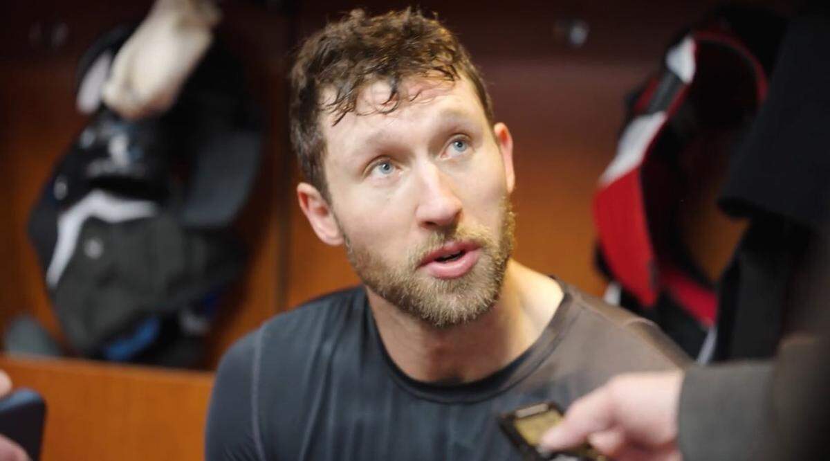 In this screen grab from a video interview, Carolina Hurricanes defenseman Jaccob Slavin answers questions at his locker after morning skate at Lenovo Center in Raleigh, N.C., on Saturday, Jan. 10, 2026. Slavin is making his return to the lineup after two separate, lengthy injury absences this season.