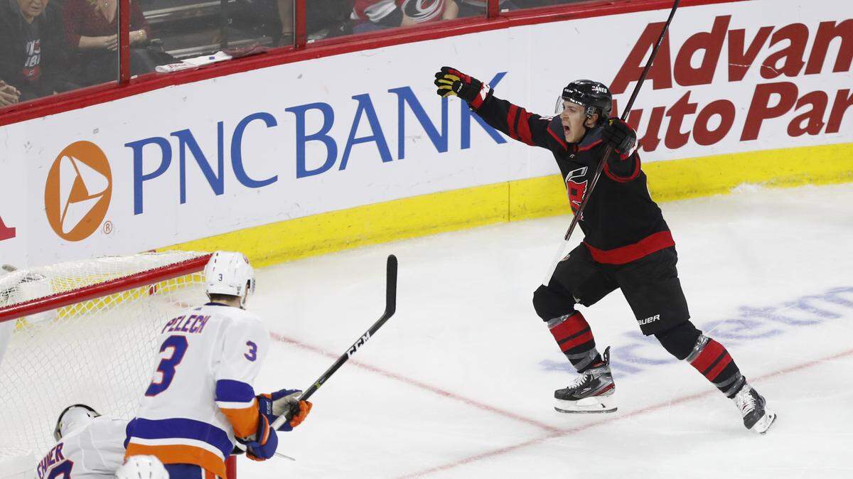Carolina’s Teuvo Teravainen (86) celebrates after scoring on New York’s Robin Lehner (40) during the second period of the Carolina Hurricanes’ game against the New York Islanders at PNC Arena in Raleigh Friday, May 3, 2019.