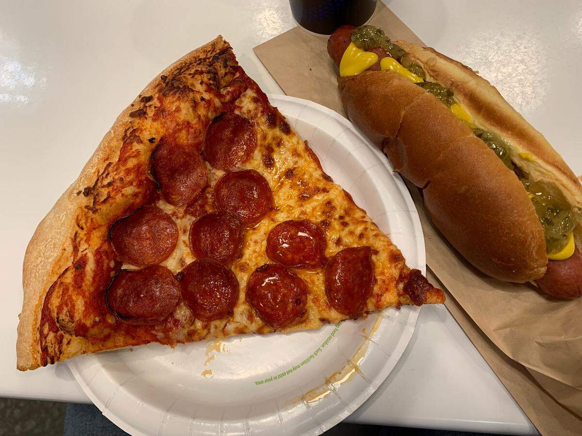 A feast of pizza, a hot dog and a soda can be had a the Costco food court for $3.75.