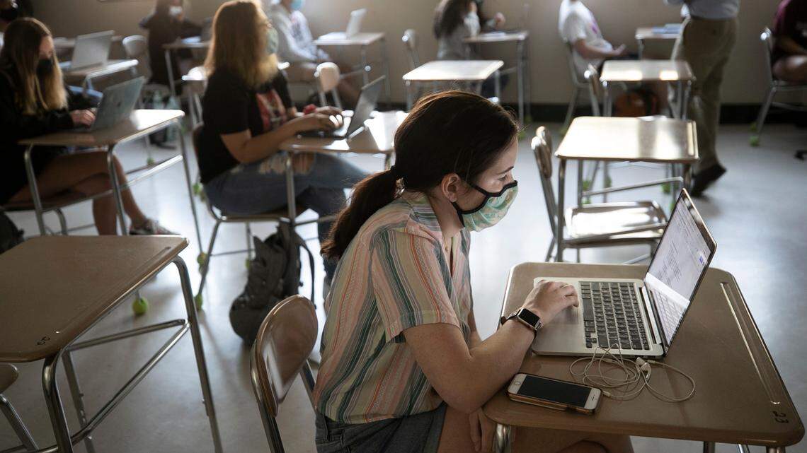 Broughton High School student Maggie Montgomery attends Marlin Jones’ American History class on Thursday, April 8, 2021 in Raleigh, N.C.