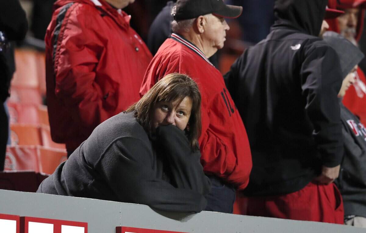 A Wolfpack fan watches during the second half of Wake Forest’s 27-23 victory over N.C. State at Carter-Finley Stadium in Raleigh, N.C., Thursday, Nov. 8, 2018.