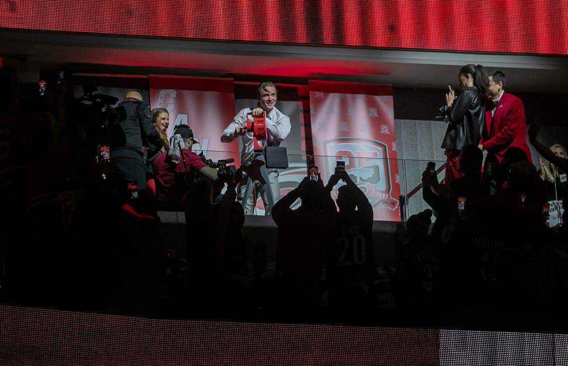 Carolina Hurricanes’ Andrei Svechnikov, out with an injury, sounds the warning siren as his teammates take the ice for their game against the New York Islanders in game one of their first round Stanley Cup series on Monday, April 17, 2023 at PNC Arena in Raleigh, N.C.