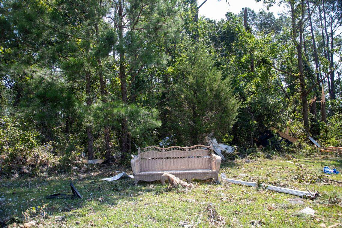 Lawn furniture and debris sits about 50 yards from the nearest home on Great Glen in the Belmont Lakes Country Club community in Rocky Mount Thursday, July 20, 2023. An EF3, tornado with wind speeds of 150 mph touched down in Nash County Wednesday around 12:30 p.m. Wednesday according to the Raleigh National Weather Service..