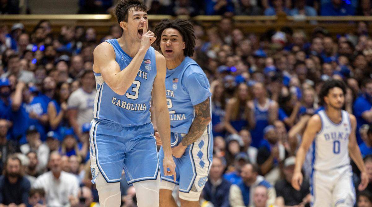 North Carolina’s Cormac Ryan (3) reacts after sinking his third three-point basket in the first half to give the Tar Heels’ a 15-4 lead over Duke on Saturday, March 9, 2024 at Cameron Indoor Stadium in Durham, N.C.