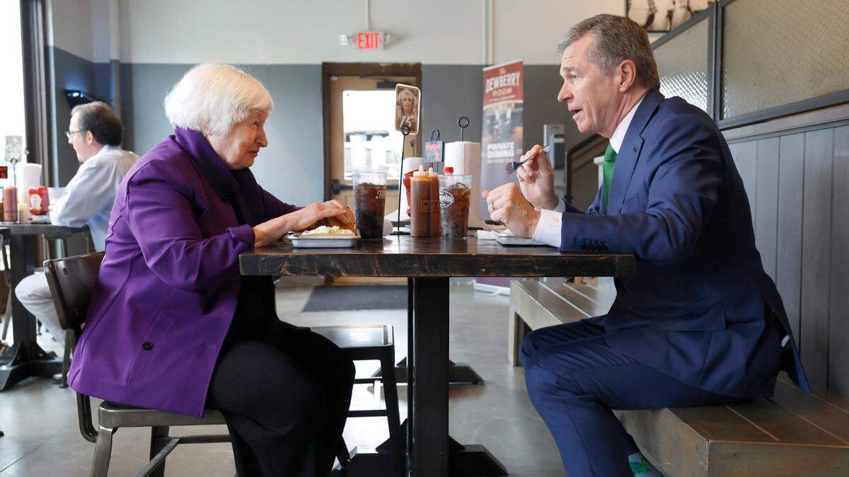U.S. Secretary of the Treasury Janet Yellen and N.C. Gov. Roy Cooper enjoy lunch at Sam Jones BBQ in Raleigh Thursday, Sept. 5, 2024.