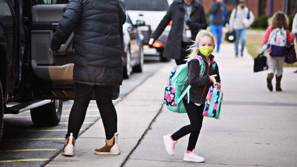 Don’t remove your face mask just yet. Some NC schools still require them outdoors.