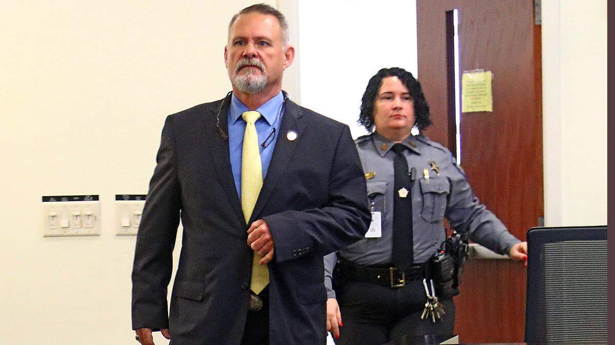 Columbus County Sheriff Jody Greene enters a courtroom in Columbus County Courthouse Wednesday morning for his removal hearing.