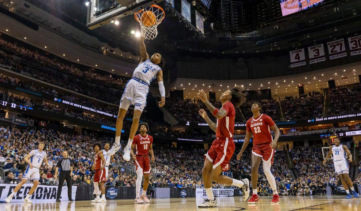Duke forward Isaiah Evans (3) breaks to the basket for a dunk in the first half against Alabama on Saturday, March 29, 2025 during the NCAA East Regional final at Prudential Center in Newark, N.J.
