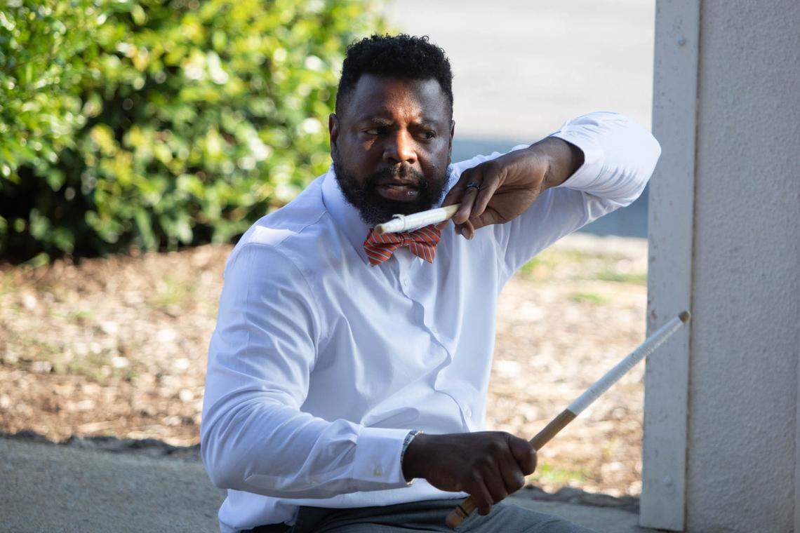 Alando Mitchell, director of the Drummers World Drumline & Performing Arts School, teaches his youngest drummers at the Boys & Girls Clubs of Wayne County in Goldsboro, N.C., on Aug. 9, 2021.