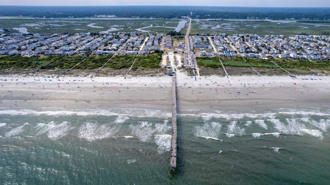 Sunset Beach Pier juts out into the Atlantic Ocean. North Carolina’s coast is home to 19 fishing piers.