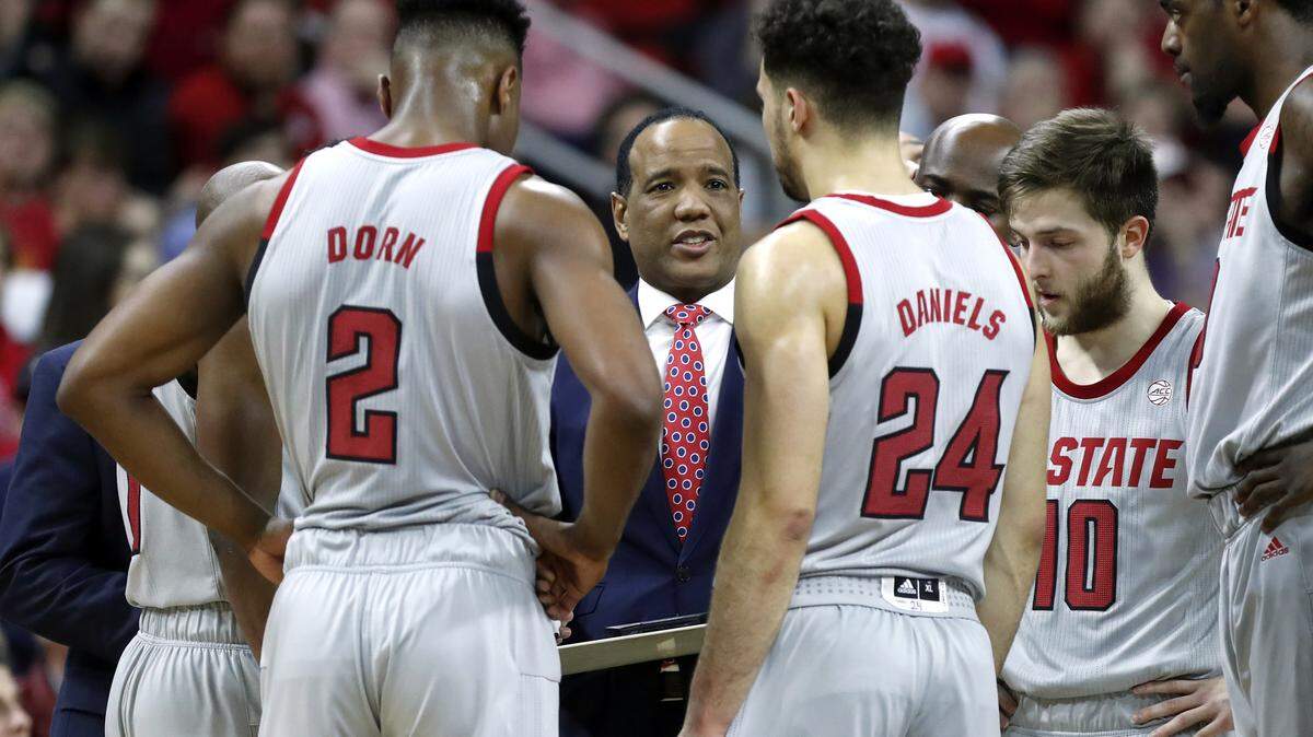 N.C. State head coach Kevin Keatts talks with his team during the first half of N.C. State’s game against Georgia Tech at PNC Arena in Raleigh, N.C., Wednesday, March, 6, 2019.