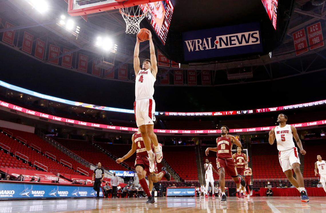 N.C. State’s Jericole Hellems (4) heads to slam in two during N.C. State’s 79-76 victory over Boston College at PNC Arena in Raleigh, N.C., Wednesday, December 30, 2020.