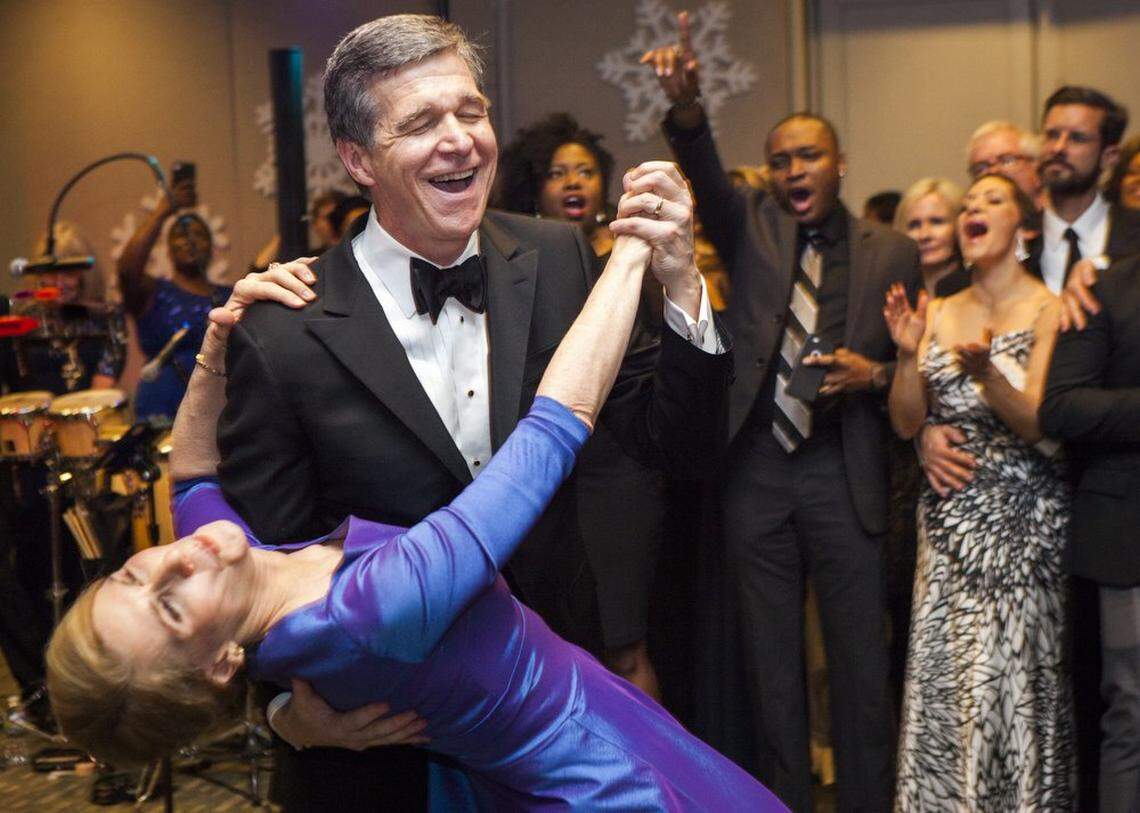 Gov. Roy Cooper dances with first lady Kristin Cooper at the inaugural ball to celebrate his inauguration at Marbles Kids Museum in downtown Raleigh on Friday, Jan. 6, 2017.