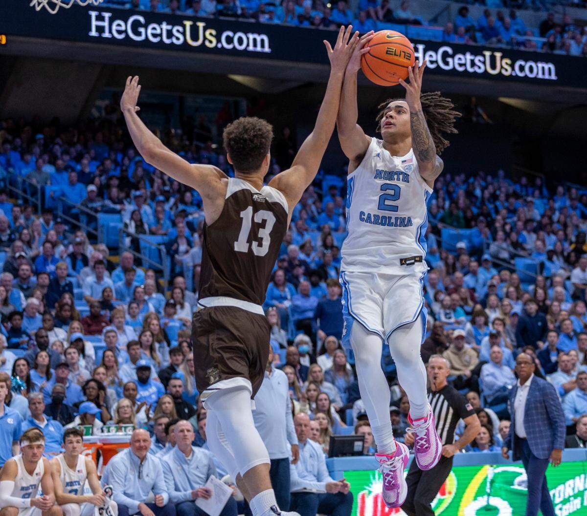 North Carolina’s Elliot Cadeau (2) drives against Lehigh’s Keith Higgins Jr. (13) in the second half on Sunday, November 12, 2023 at the Smith Center in Chapel Hill, N.C.
