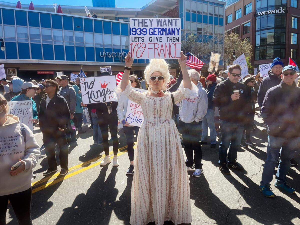Sara Swartzwelder, visiting family in Durham from New York, dressed as Marie Antoinette, the infamous queen toppled by the French Revolution. Swartzwelder said she saw someone with the “let’s give them 1789 France” sign and thought she'd “kick it up a notch.”