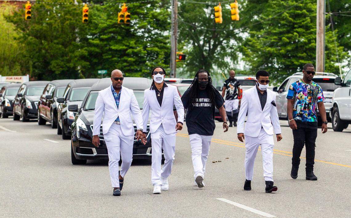 Family and pallbearers walk in a caisson procession for Andrew Brown Jr. in Elizabeth City, NC prior to a funeral service Monday, May 3, 2021. Brown was shot and killed by Pasqoutank County Sheriff deputies in April.