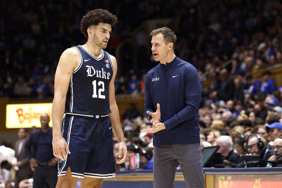 Duke head coach Jon Scheyer talks to Cameron Boozer (12) during the second half of Duke’s 67-49 victory over Boston College at Cameron Indoor Stadium in Durham, N.C., Tuesday, Feb. 3, 2026.
