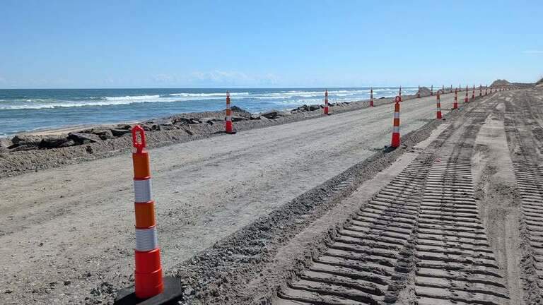 NC 12 will reopen to visitors on Hatteras Island, but it will be slow going