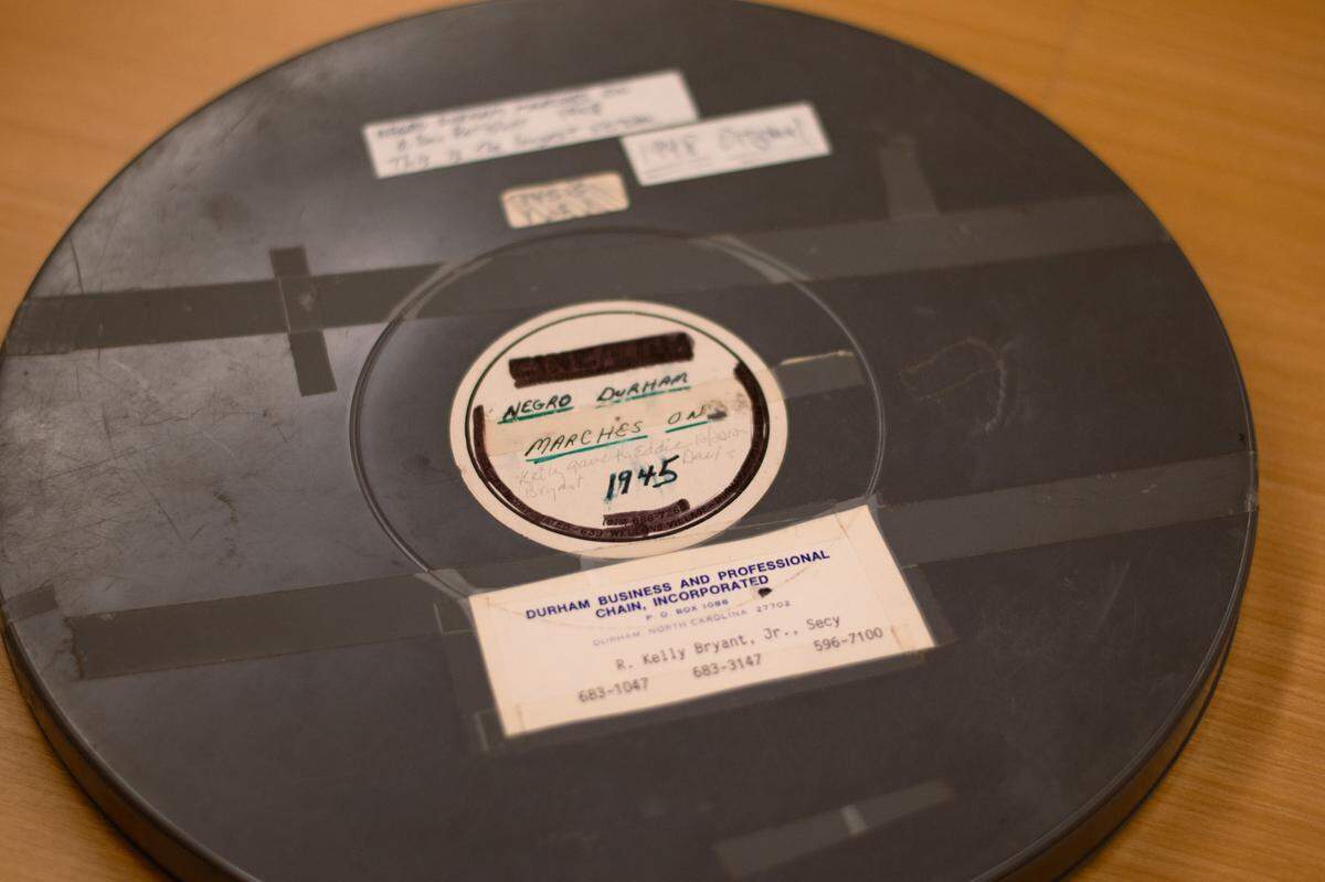 The storage can of the original print of the 1948 film “Negro Durham Marches On,” donated by the late R. Kelly Bryant. The film takes viewers back to a long-gone, bustling business district wiped out by the development of the Durham Freeway in the late 1950s.